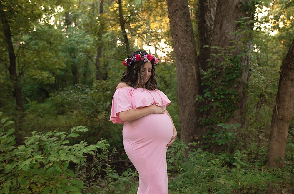 Pregnant Mother with floral Crown in Pink Dress
